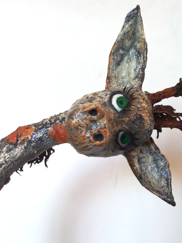 How to Upcycle Empty Bottles into Faux Stone Creatures - Image 3